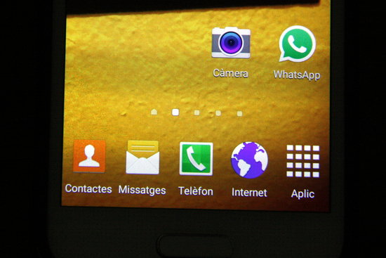 A phone with various apps, including the WhatsApp messaging service (by José Soler)